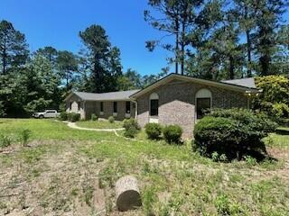 4521 Zola Dr, Evans, GA 30809 - rear view of house featuring a lawn