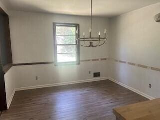 4521 Zola Dr, Evans, GA 30809 - unfurnished dining area featuring a chandelier and wood finished floors