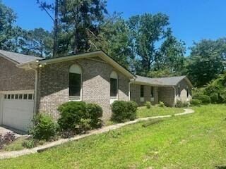4521 Zola Dr, Evans, GA 30809 - view of property exterior featuring an attached garage, a yard, and concrete driveway