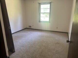 4521 Zola Dr, Evans, GA 30809 - spare room with carpet