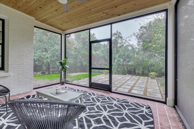 sunroom / solarium featuring wood ceiling