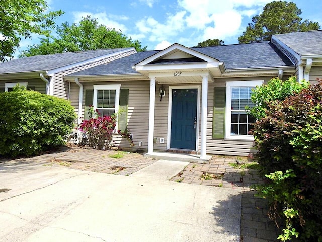 1235 Longpoint Dr, Augusta, GA 30906 - view of exterior entry featuring a shingled roof
