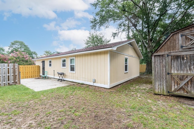 3973 Concord Pl, Martinez, GA 30907 - back of property featuring a patio area and a storage unit