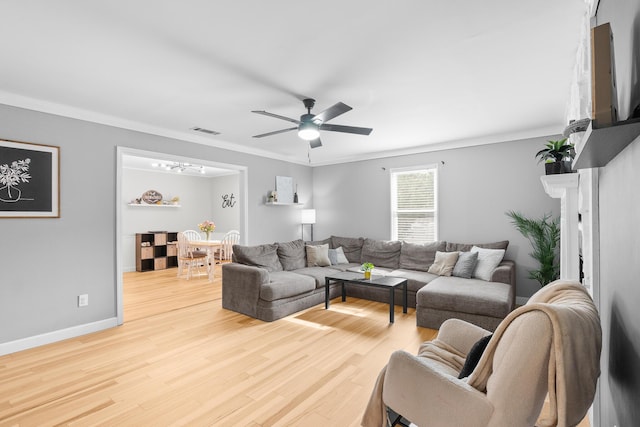 3973 Concord Pl, Martinez, GA 30907 - living area with wood finished floors, crown molding, a chandelier, and a ceiling fan