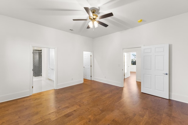 interior space featuring ceiling fan and dark wood-type flooring