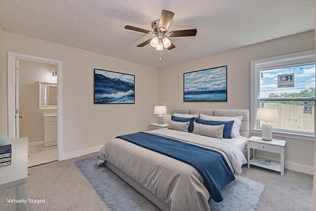 2001 Hiram Rd, Augusta, GA 30904 - bedroom featuring light colored carpet, ensuite bathroom, and ceiling fan