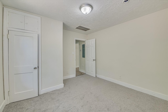 2001 Hiram Rd, Augusta, GA 30904 - unfurnished bedroom with light colored carpet and a textured ceiling