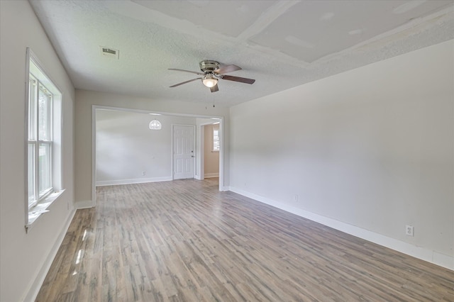 2001 Hiram Rd, Augusta, GA 30904 - spare room featuring wood finished floors, ceiling fan, and a textured ceiling