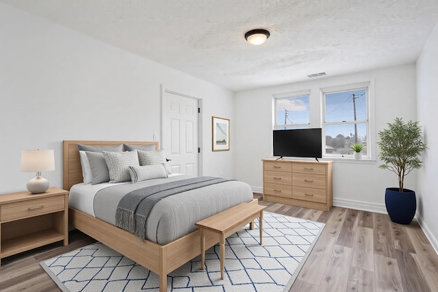 1717 Kentucky Ave, Augusta, GA 30904 - bedroom featuring visible vents, baseboards, and light wood-style floors