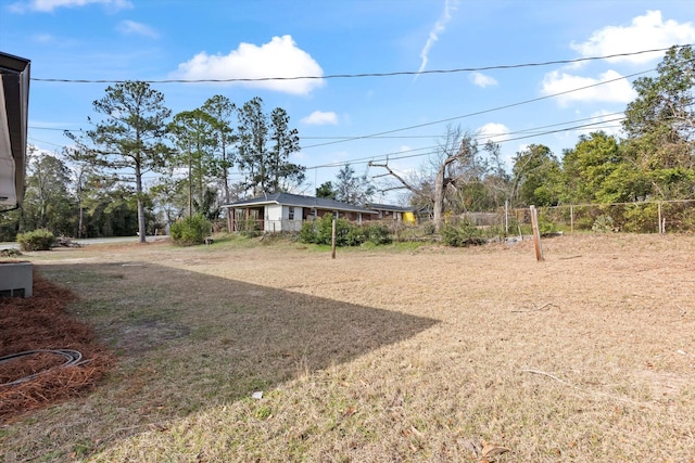 view of yard featuring fence