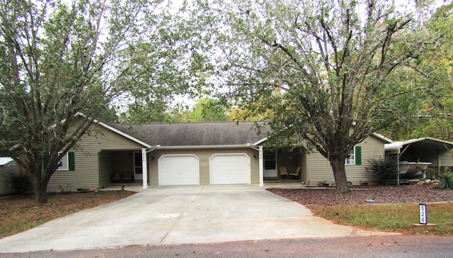 ranch-style home featuring a carport and a garage