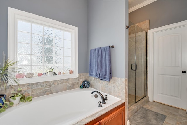 full bathroom featuring healthy amount of natural light, a shower stall, a bath, and crown molding