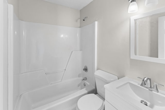 full bathroom featuring vanity, shower / bathtub combination, and toilet