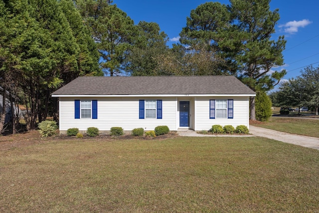 single story home with a front yard