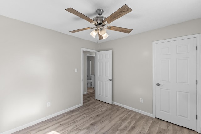 unfurnished bedroom with light hardwood / wood-style floors and ceiling fan