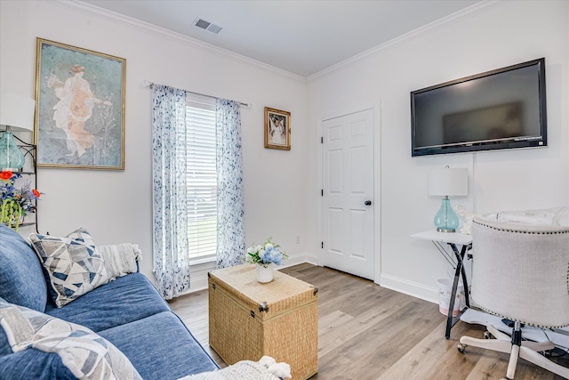 670 Callaway Dr, Graniteville, SC 29829 - living room featuring wood finished floors, ornamental molding, healthy amount of natural light, and baseboards