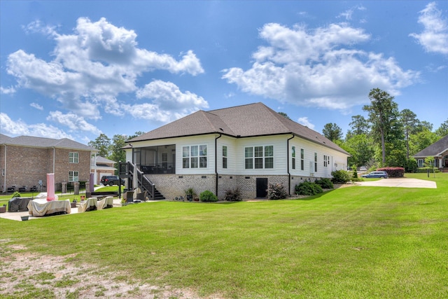 670 Callaway Dr, Graniteville, SC 29829 - back of property featuring a sunroom, a lawn, and stairs