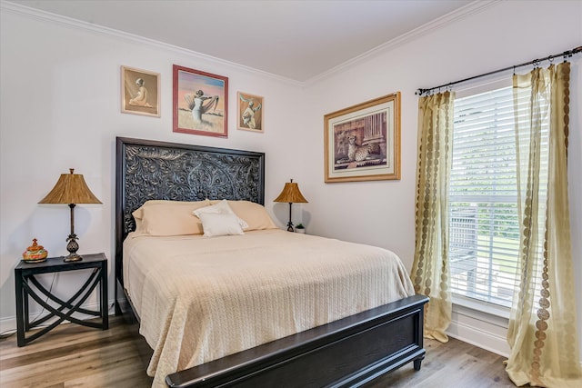 670 Callaway Dr, Graniteville, SC 29829 - bedroom with wood finished floors, crown molding, and baseboards