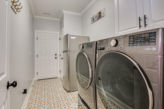 670 Callaway Dr, Graniteville, SC 29829 - laundry room featuring cabinet space, baseboards, washing machine and dryer, and crown molding