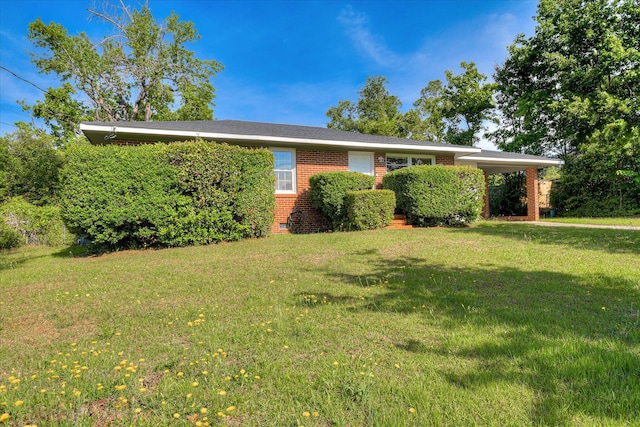 2013 Lamar Rd, Augusta, GA 30904 - single story home with brick siding, a front lawn, and a carport