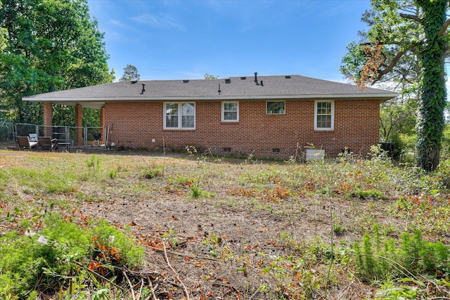 2013 Lamar Rd, Augusta, GA 30904 - back of house with crawl space, fence, brick siding, and roof with shingles