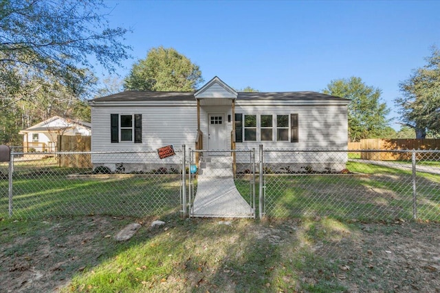 ranch-style house with a front yard