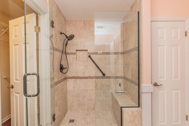 bathroom featuring walk in shower