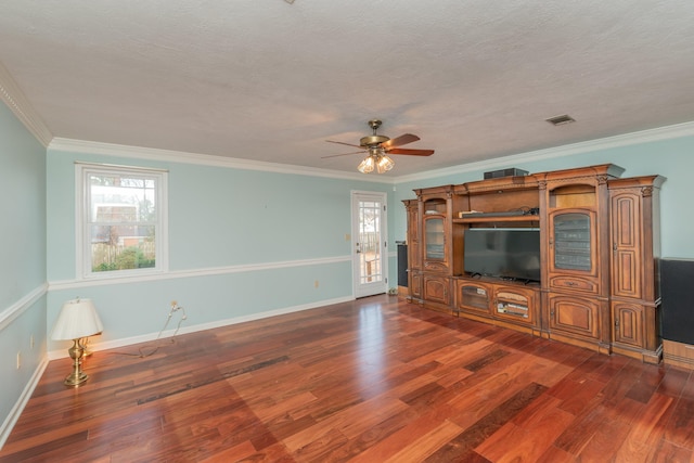 unfurnished living room featuring ceiling fan, dark hardwood / wood-style floors, and ornamental molding