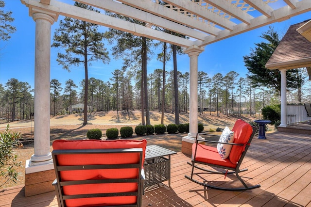 wooden deck featuring a pergola