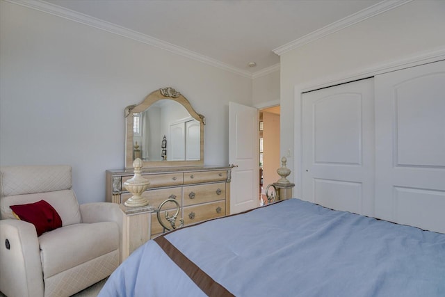 bedroom with ornamental molding and a closet