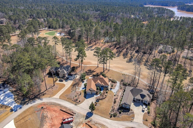 aerial view featuring a forest view