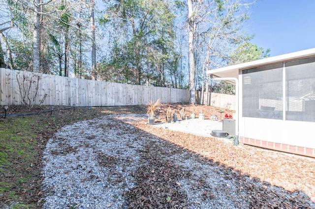 view of yard with a sunroom