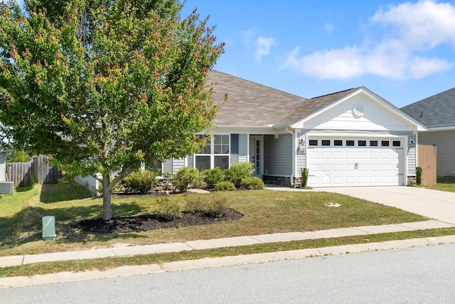 7058 Summerton Dr, Augusta, GA 30909 - view of front facade featuring a garage, roof with shingles, concrete driveway, and a front lawn