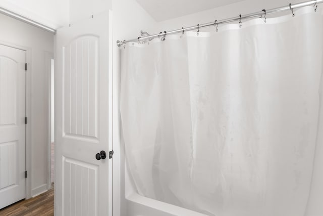 7058 Summerton Dr, Augusta, GA 30909 - full bath featuring shower / tub combo with curtain and wood finished floors