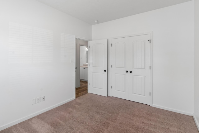 7058 Summerton Dr, Augusta, GA 30909 - unfurnished bedroom featuring baseboards, carpet flooring, and a closet