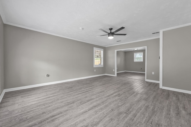 3808 Southfield Dr, Augusta, GA 30906 - empty room with a ceiling fan, wood finished floors, baseboards, and crown molding