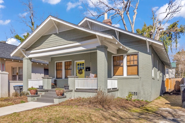 craftsman-style house featuring covered porch