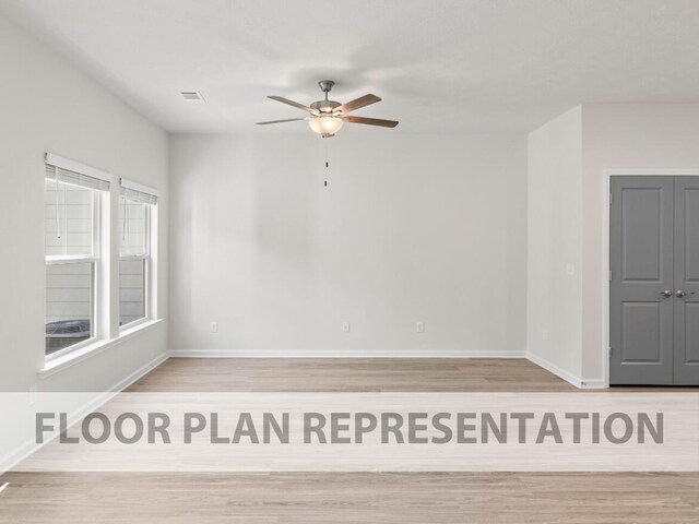 1301 Newbern Dr, Grovetown, GA 30813 - unfurnished room featuring a ceiling fan and wood finished floors
