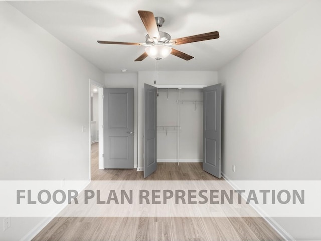 1301 Newbern Dr, Grovetown, GA 30813 - unfurnished bedroom with wood finished floors, a closet, and ceiling fan