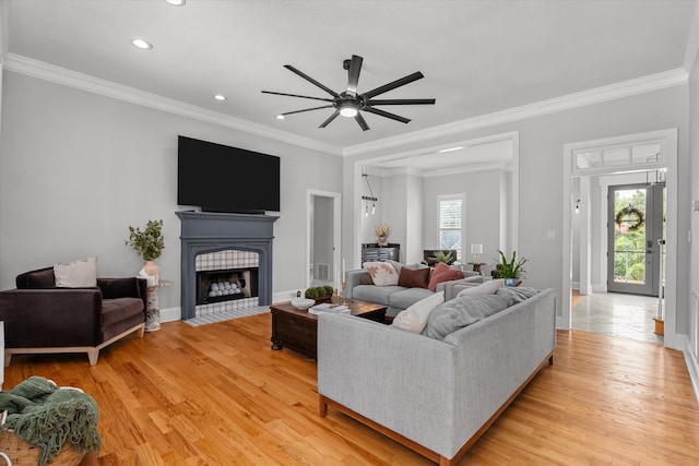1423 Knob Hill Cir, Evans, GA 30809 - living area featuring a fireplace with flush hearth, ceiling fan, light wood-style flooring, crown molding, and recessed lighting