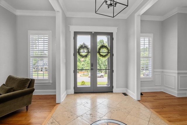 1423 Knob Hill Cir, Evans, GA 30809 - entrance foyer featuring french doors, ornamental molding, a chandelier, and baseboards