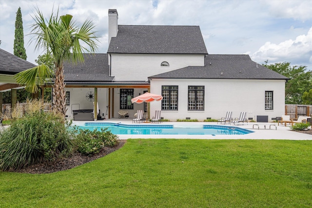 1423 Knob Hill Cir, Evans, GA 30809 - rear view of property with a jacuzzi, a patio area, a chimney, and an outdoor pool