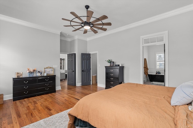 1423 Knob Hill Cir, Evans, GA 30809 - bedroom featuring ornamental molding, wood finished floors, baseboards, ensuite bathroom, and ceiling fan