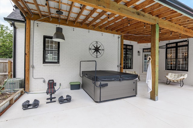 1423 Knob Hill Cir, Evans, GA 30809 - view of patio featuring a hot tub and central AC unit