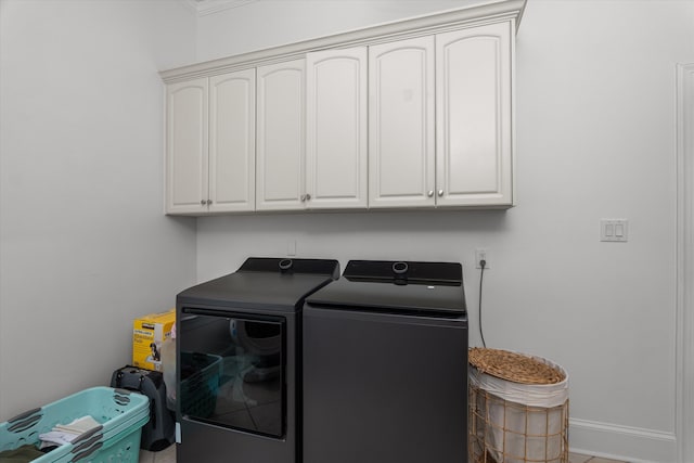 1423 Knob Hill Cir, Evans, GA 30809 - laundry area with washing machine and clothes dryer, cabinet space, and crown molding
