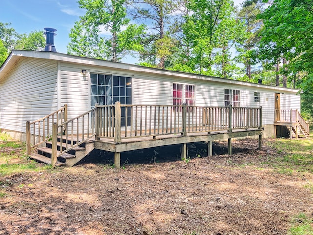4112 Quail Farm Rd, Thomson, GA 30824 - back of property featuring a wooden deck