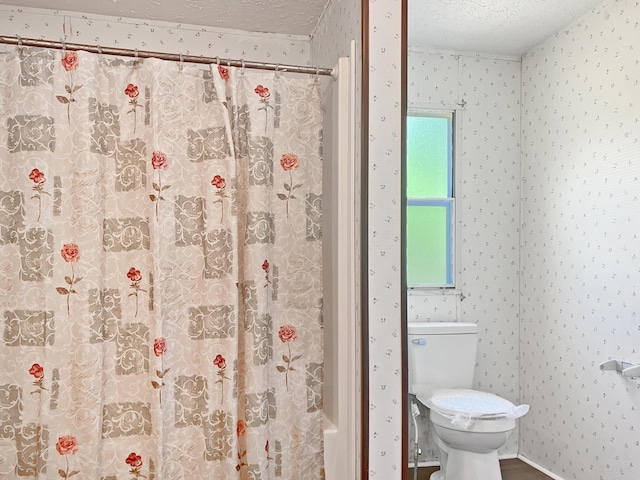 4112 Quail Farm Rd, Thomson, GA 30824 - full bathroom with toilet, wallpapered walls, a textured ceiling, and a shower with shower curtain