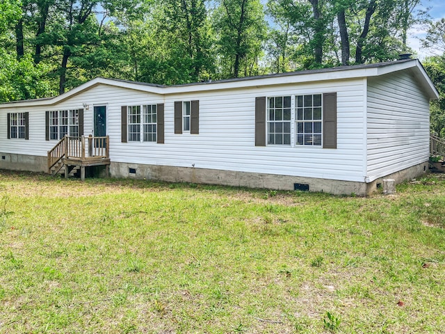 4112 Quail Farm Rd, Thomson, GA 30824 - manufactured / mobile home featuring a front yard and crawl space