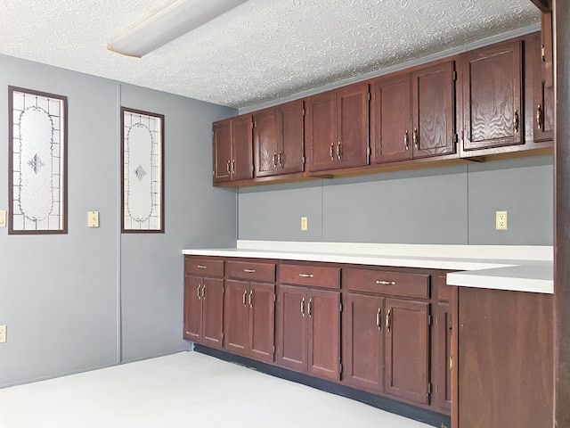 4112 Quail Farm Rd, Thomson, GA 30824 - kitchen featuring light countertops and a textured ceiling