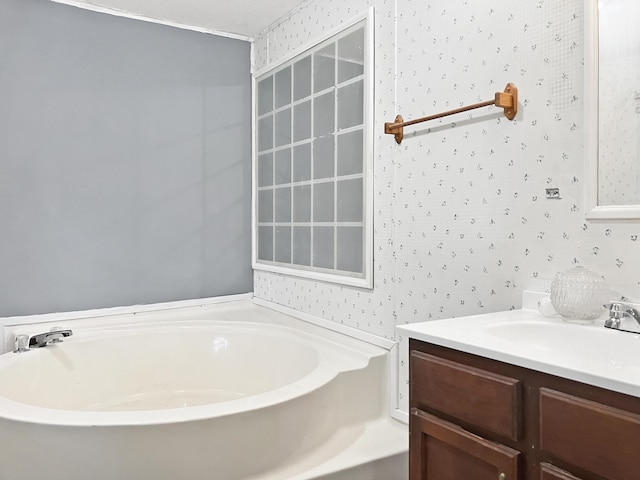 4112 Quail Farm Rd, Thomson, GA 30824 - bathroom featuring vanity, a garden tub, and wallpapered walls